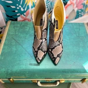Nine West; Faux snakeskin tan and black bootie